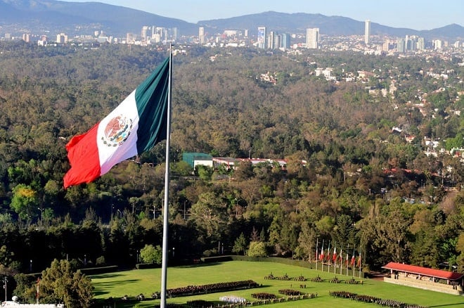 45355514 – a giant mexican national flag above mexico city, mexico.