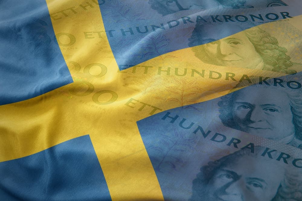 Colorful,Waving,National,Flag,Of,Sweden,On,A,Swedish,Crown
