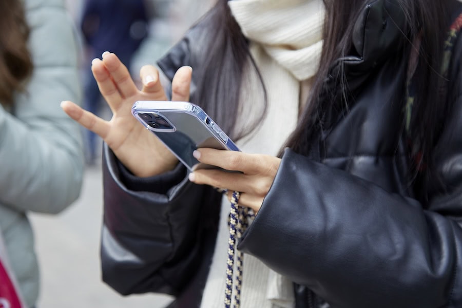 Close up of using smartphone, freelance, influencer, chatting concept