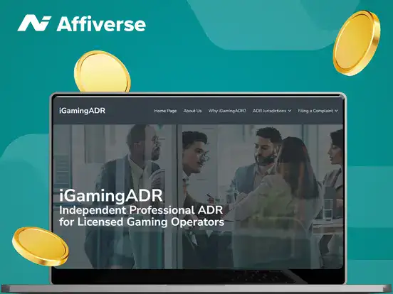 iGaming ADR's website on a laptop with three coins.
