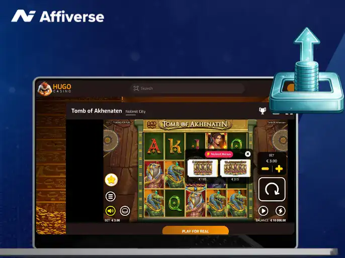 Laptop screen showing a Tomb of Akhenaten slot game with a bonus buy menu and coin icon.