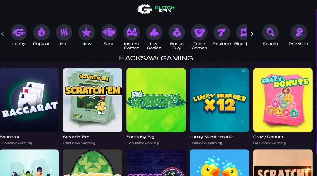 GlitchSpin lobby displaying Hacksaw Gaming titles including Scratch 'Em and Baccarat.